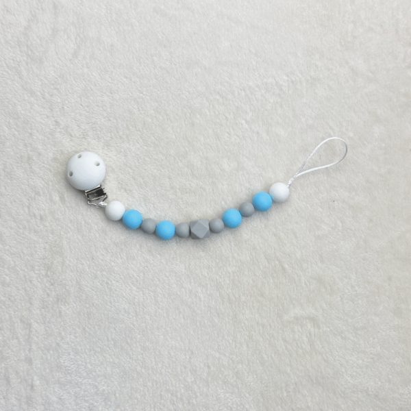 Attache10 Attache-tétine Brise Polaire